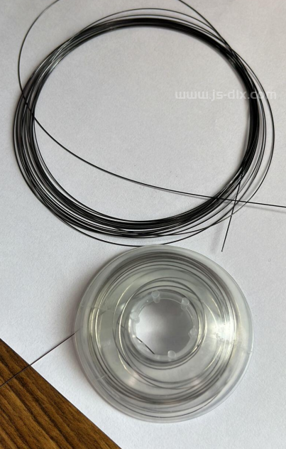 Transparent Nickel-Titanium Wire for Visual Aids